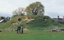Image showing erosion damage to an archaeological mound. © CADW/Matt Ritchie
